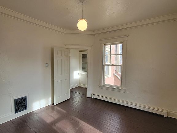 Extra room can be used as dining room or office