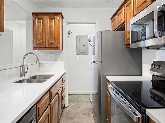 2nd image of 12027 W 58th Pl APT B