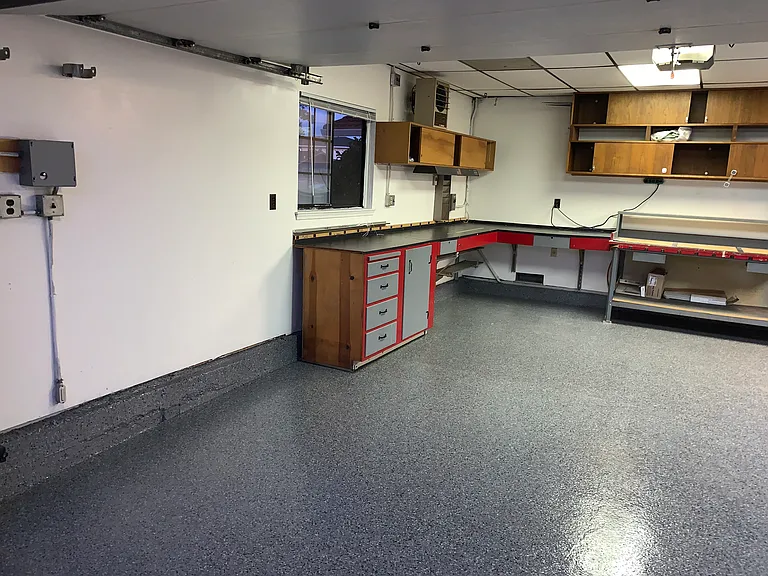 Garage with built-in workbench, ideal for projects and extra storage