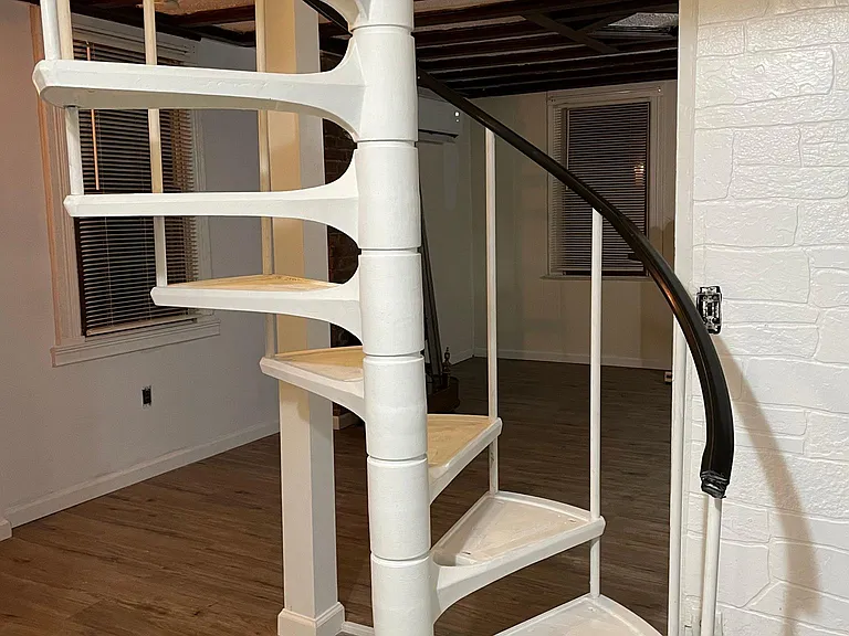 Vintage spiral staircase reminiscent of times gone by
