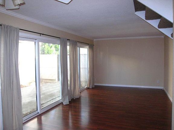 Spacious LR opens onto private gated courtyard.