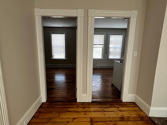 Door to the left is the first bedroom- door to the right is the kitchen