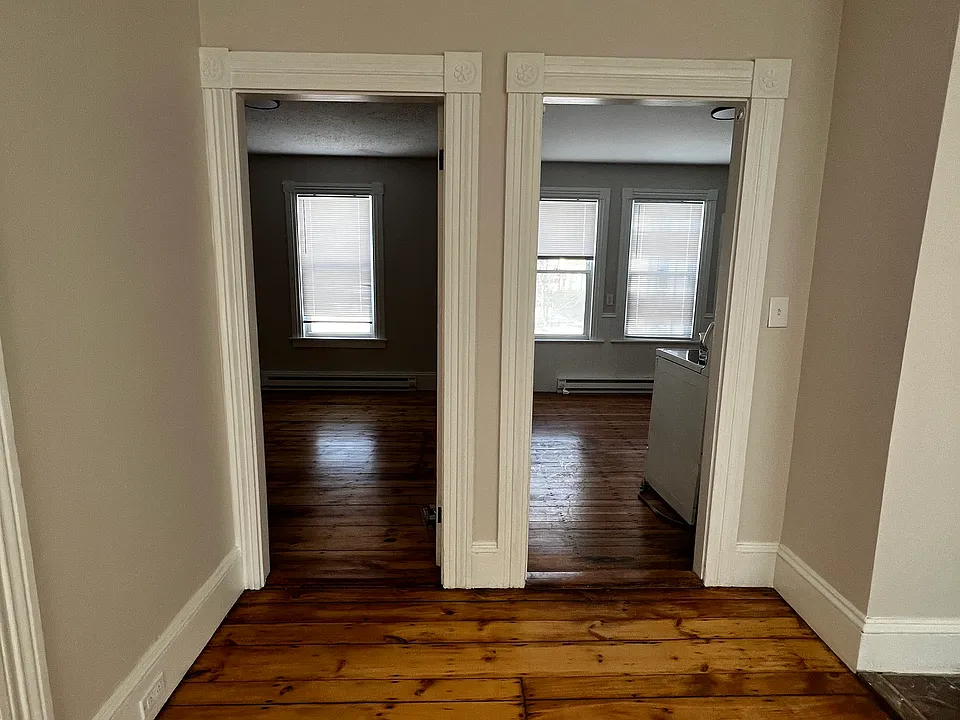 Door to the left is the first bedroom- door to the right is the kitchen