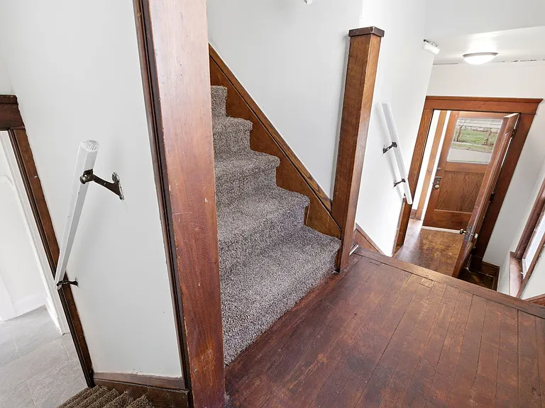 Stairs from Entry and Kitchen