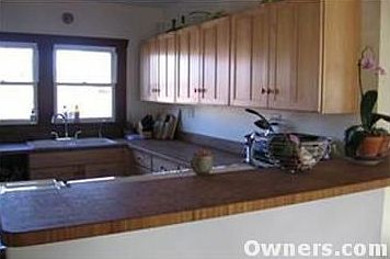Kitchen--view from dining room over bar