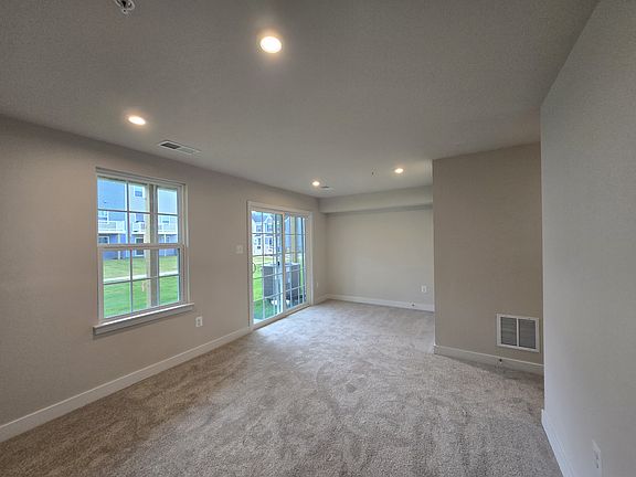 main floor living room that leads to back yard