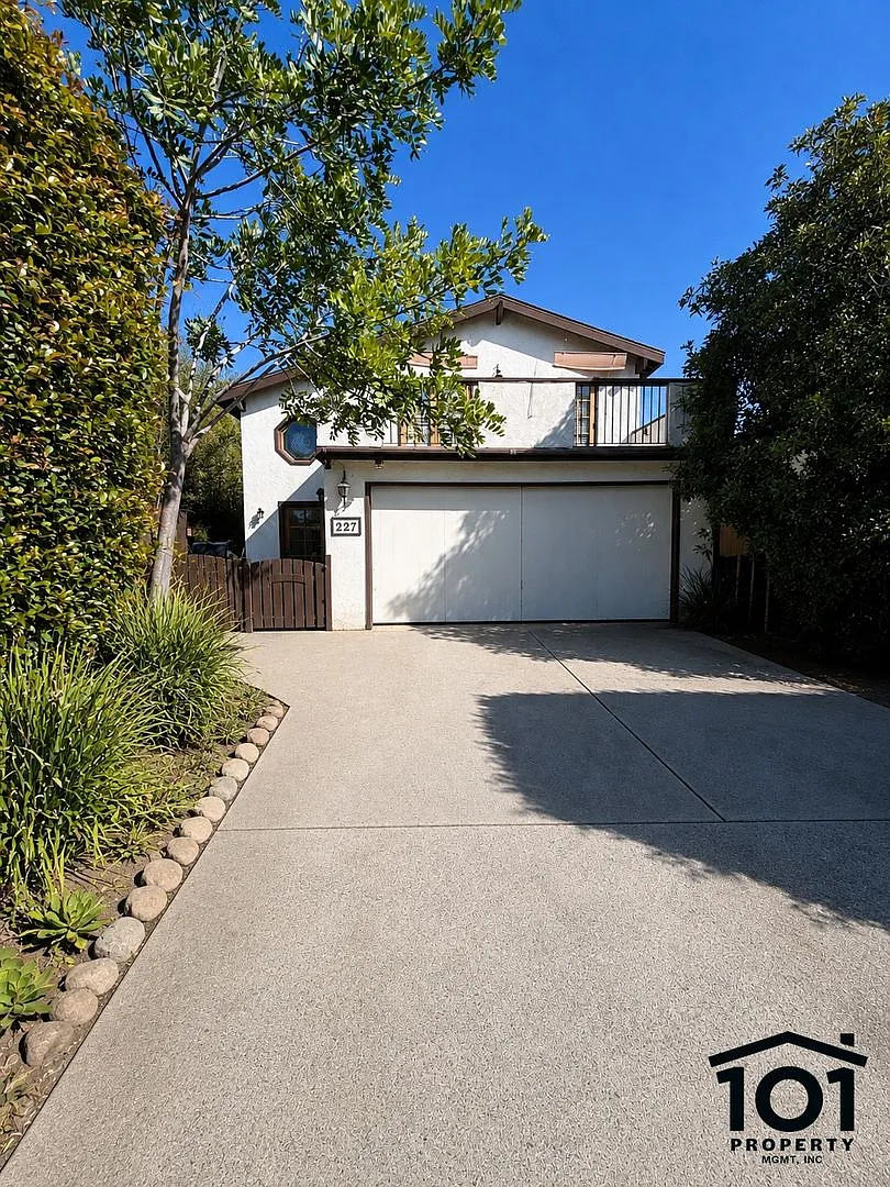 Spacious & Unique Home with Vaulted Ceilings, Private Balcony & Multiple Living Areas — Photo 1