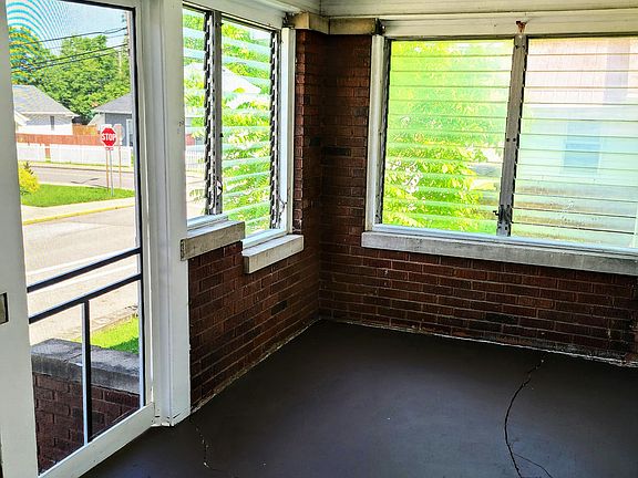 Front Porch with glassed in windows