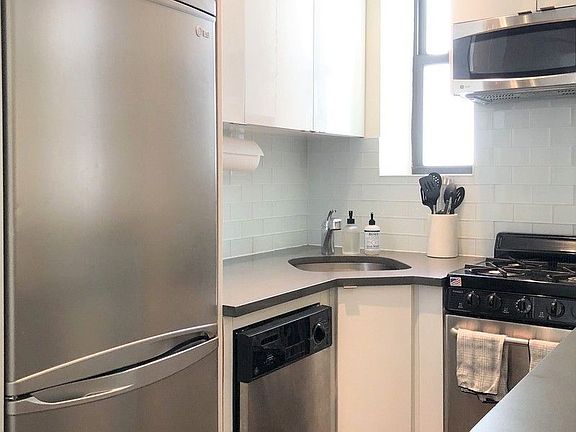 3rd image of 50 E 3rd St