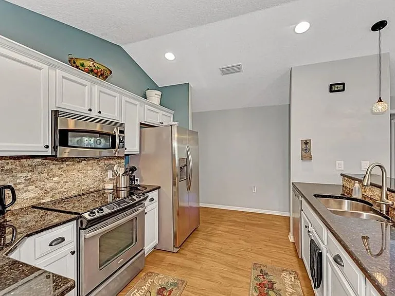 12401 Kerman Ct — Photo 4