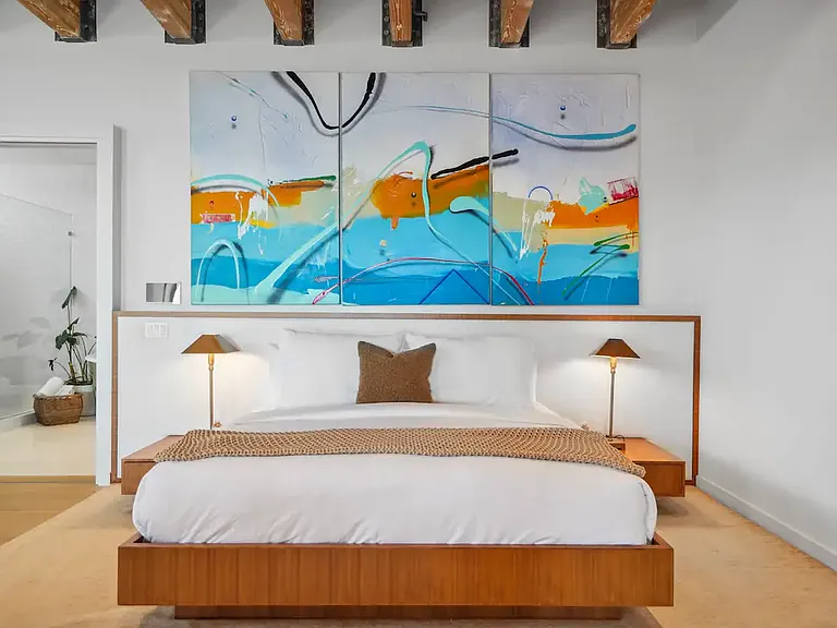 Spacious king-sized bed with luxurious Egyptian cotton linens.