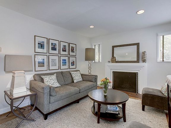 Living Room w/Wood Burning Fireplace