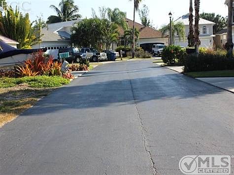 Facing lot, looking down street to the left.