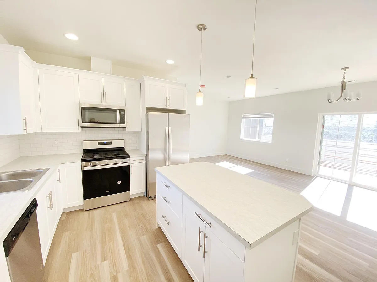 beautiful open airy kitchen with views to dining and living area! Lots of natural light... - 19017 State Route Ave