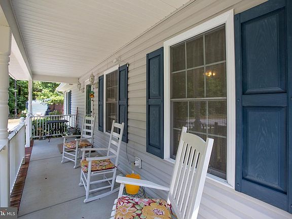 Enjoy Morning Coffee Or Tea on the 24' Front Porch