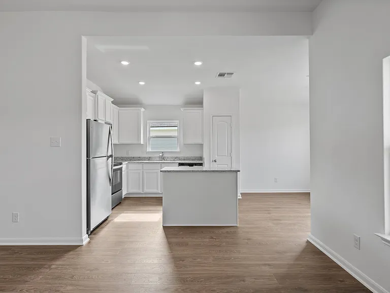 A chef-ready kitchen with an island.