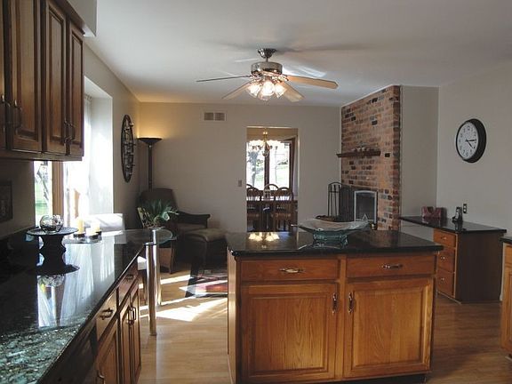 Extended kitchen area with fireplace