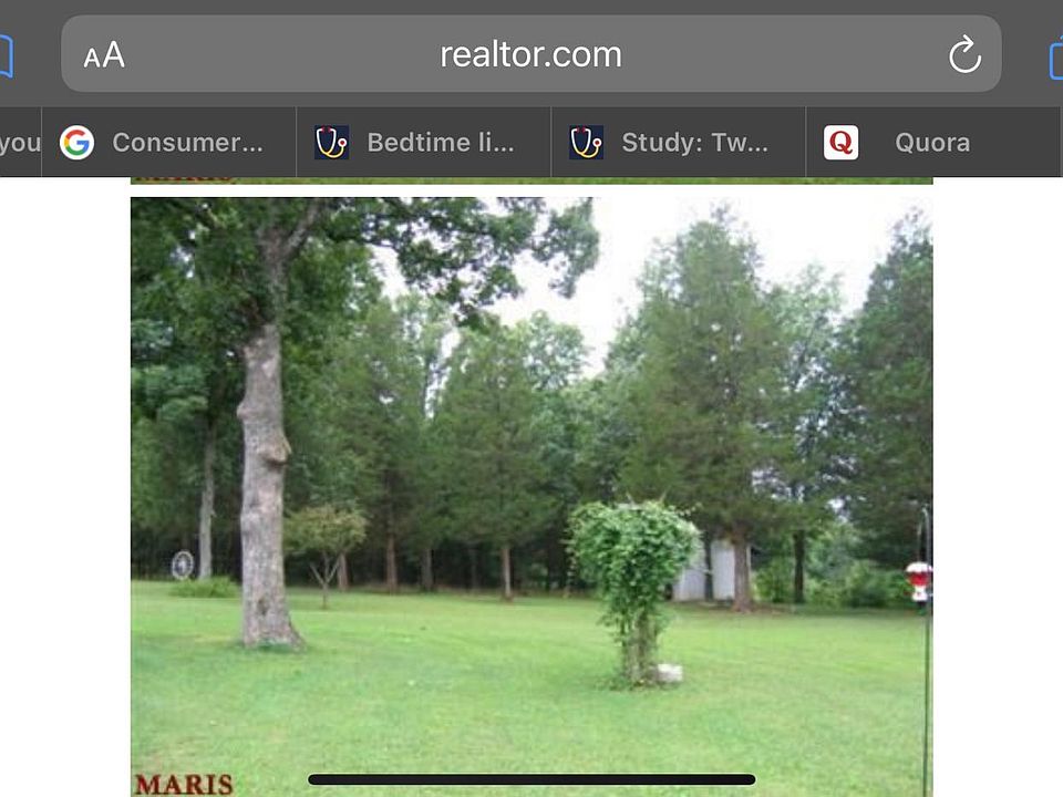 back yard with view of covered deck