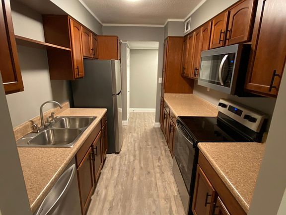 Galley Style Kitchen with Upgraded Appliances
