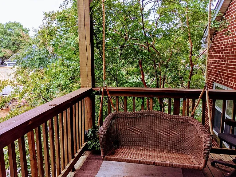 Porch swing and front porch