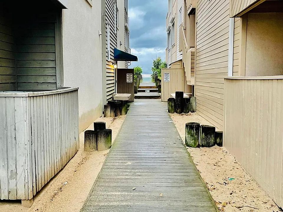 Walk to the beach between the two buildings