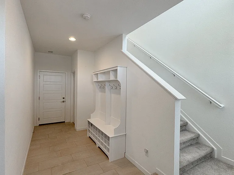 Front entry featured with additional storage/ mud room space