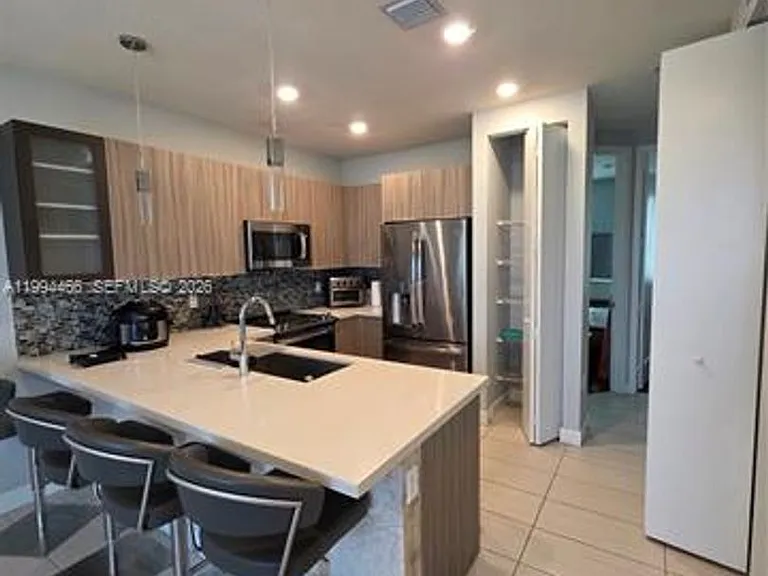 10222 NW 64th Way #302 — Photo 9