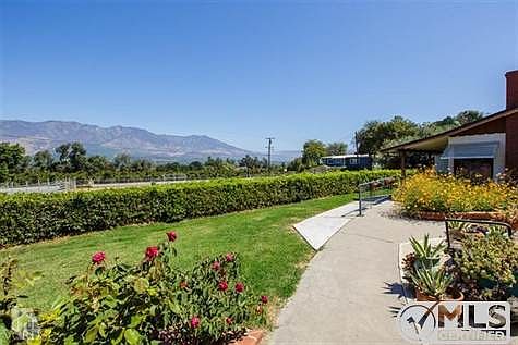 looking north at orchards and mountains.