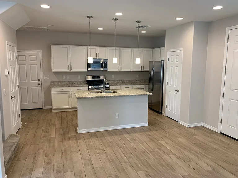Nice kitchen with pantry and center island.