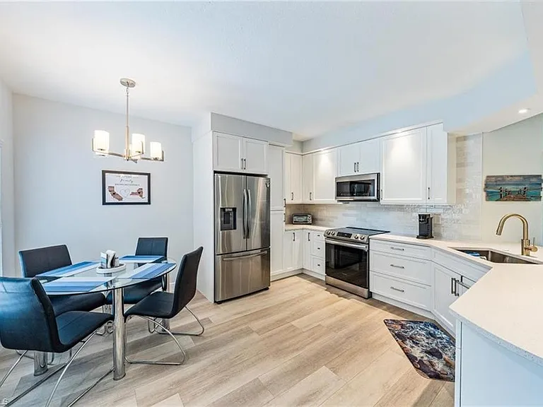 6914 Satinleaf Rd N #103 — Photo 8