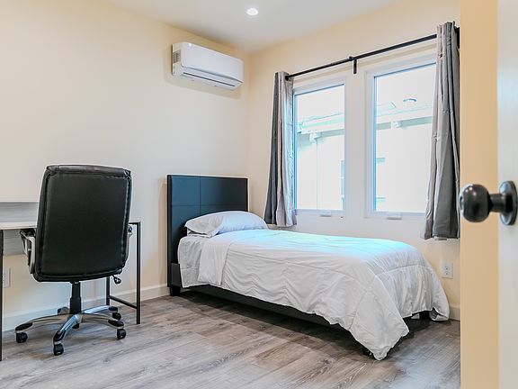 Roomy, heating and air, large closets, and two large windows. This bed is super conformable if you need furnished.