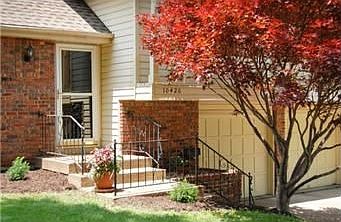 New landscaping and a beautiful Japanese Maple tree welcome you to this home.