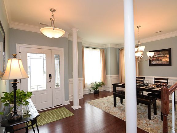 Foyer Opens to Dining Room