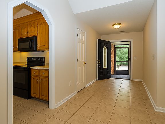 Entrance hallway leading to kitchen and living room