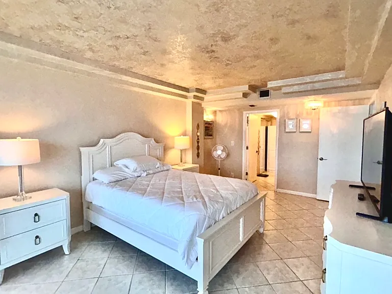 View of Primary bedroom from the beach toward bathroom
