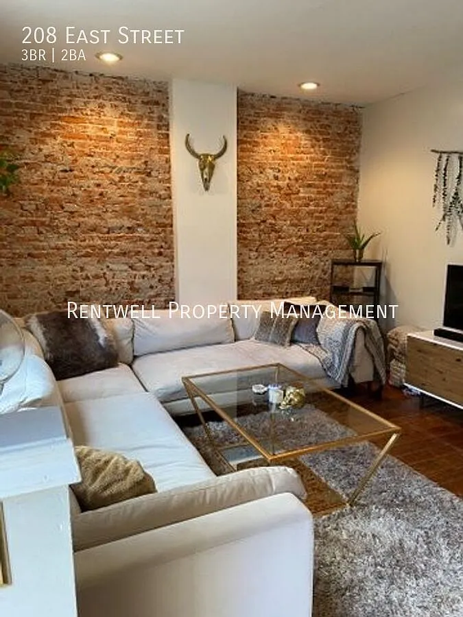 3 Bedroom Renovated Townhome with Charming Finishes — Photo 1