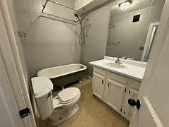 Bathroom featuring claw foot tub!