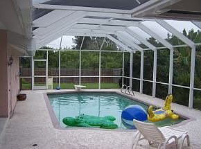 Hurricane rated screened enclosure for the pool