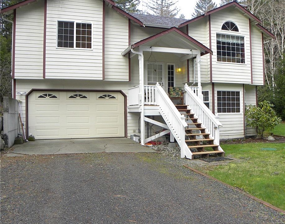 Welcome Home! This is a close up. Your home does sit back far from the road with plenty of parking on this long driveway.