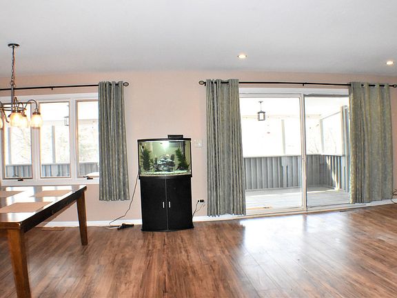 Open floor plan with kitchen, living room and dining room