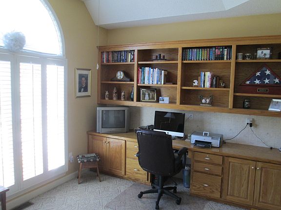 Office with built in shelves