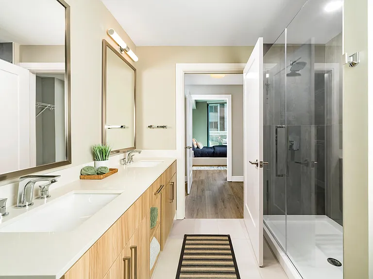A refined primary bath at Modera McGavock, featuring clean lines, generous storage, and a calming retreat with Nashville just minutes away.