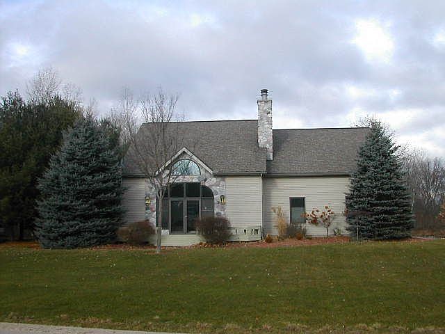 1st image of 9559 Club House Dr W