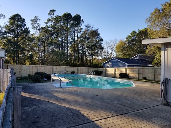 POOL WITH NEW FENCE
