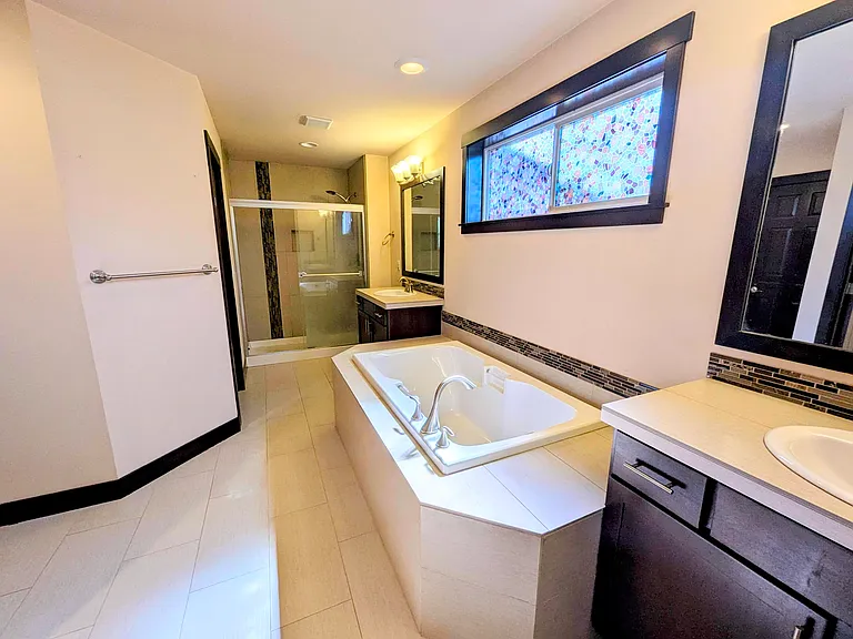Glass Shower enclosure in Master Bath