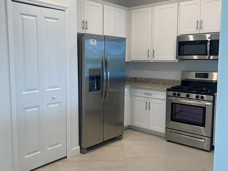 Kitchen with all new appliances, gas range