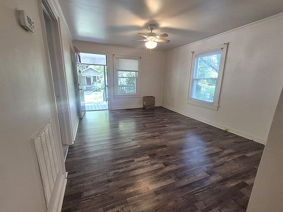 Living room, from kitchen, front door and covered sun porch, Double glazed windows, Central AC, ceiling fan.