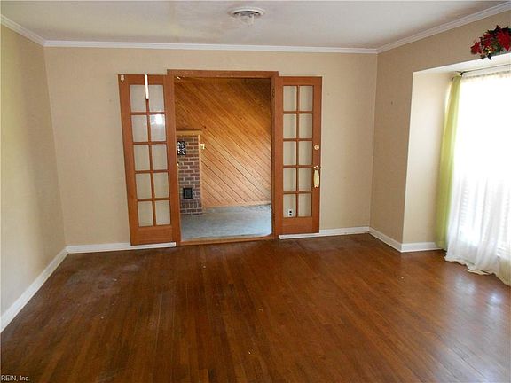 Living Room with original hard wood floors.