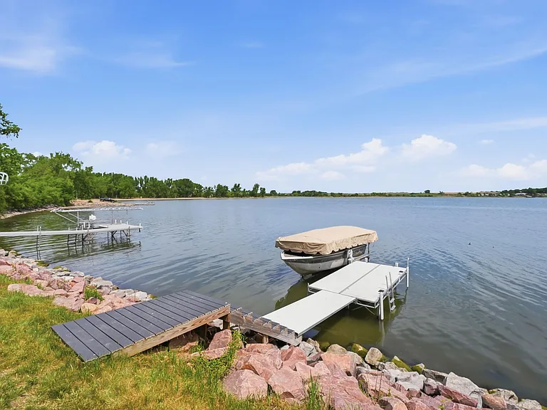 Fish or swim in the lake with a sandy bottom!