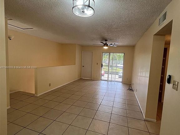 5th image of 701 Gardens Dr APT 203